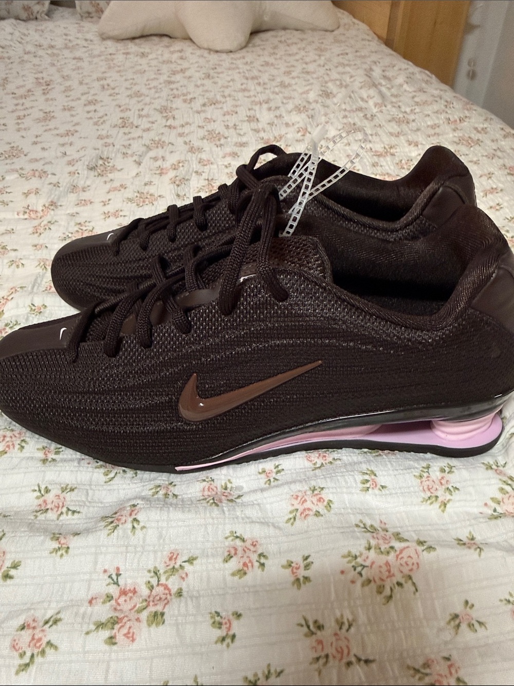 Nike Women's Dark Brown Athletic Shoes with Pink Midsole Accent